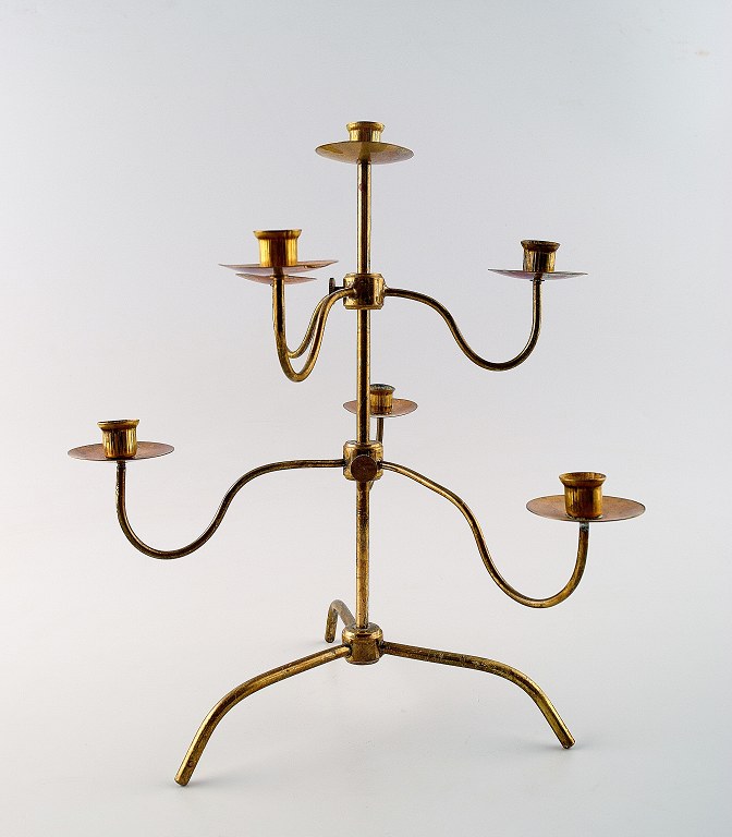 Josef Frank. Seven-armed brass candlestick.
