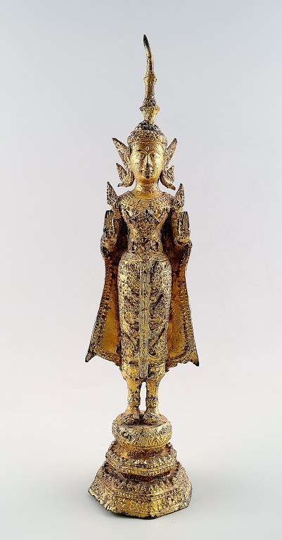 Standing Buddha, bronze.
