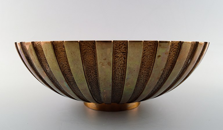 Large Tinos art deco bowl in bronze.
