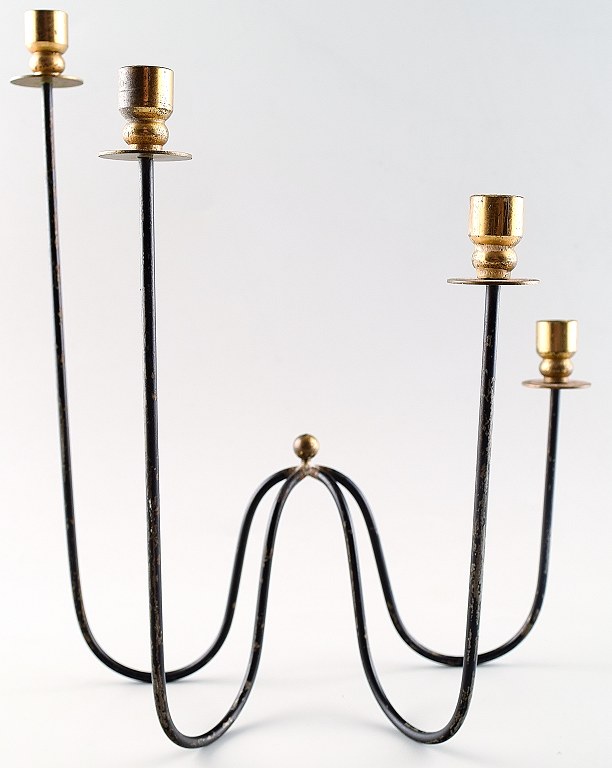 Gunnar Ander, Ystad Metall. Four-armed metal and brass candlestick.
