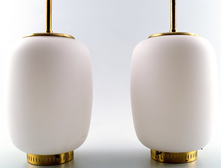 Bent Karlby: "China-lamp". A pair of opal glass pendants with brass fitting.