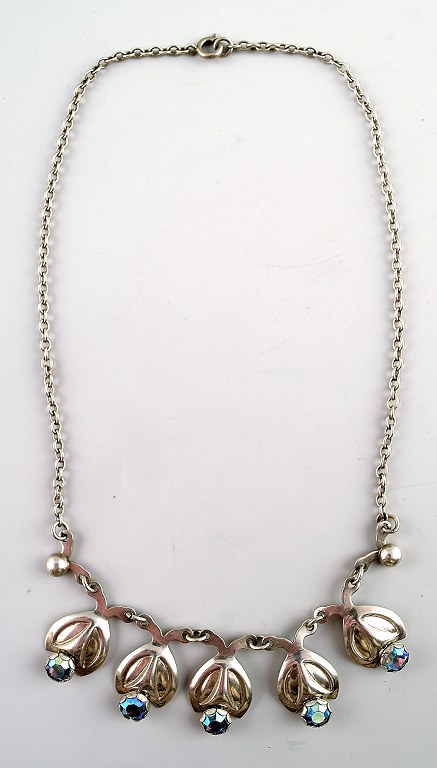 Hermann Siersbøl, Kastrup. Danish design sterling silver necklace with blue 
stones in modern design.