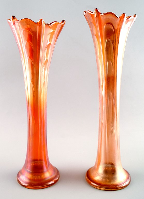 A pair of american pressure glass vases.