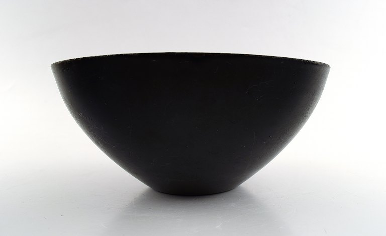 Krenit bowl by Herbert Krenchel. Black metal and red enamel.
