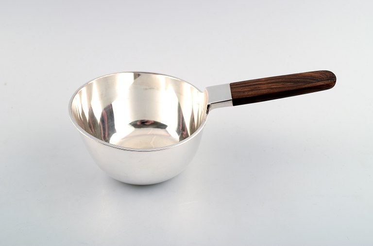 Cohr, Denmark sauce pan in silver. Rosewood handle.
