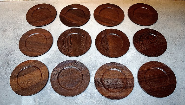 Jens Quistgaard for Kronjyden complete for 12 persons cover plates in rosewood. Danish design, 60s.