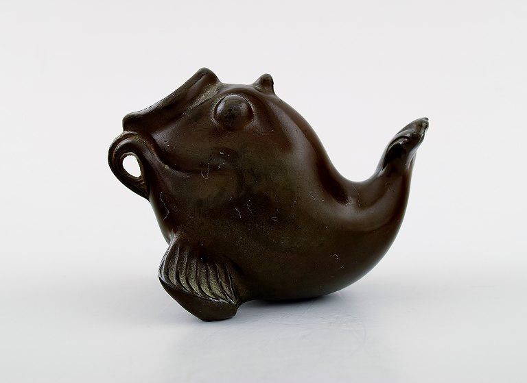 Figure of fish, designed by Just Andersen.