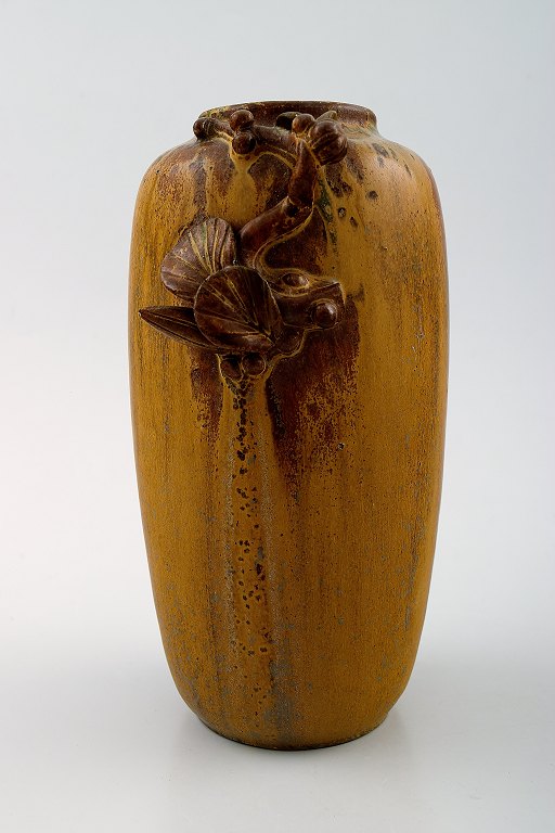 Arne Bang. Ceramic Vase with foliage.
