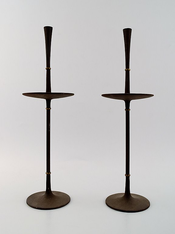 Jens H. Quistgaard, a pair of candlesticks in cast iron.
Danish design 1960s.