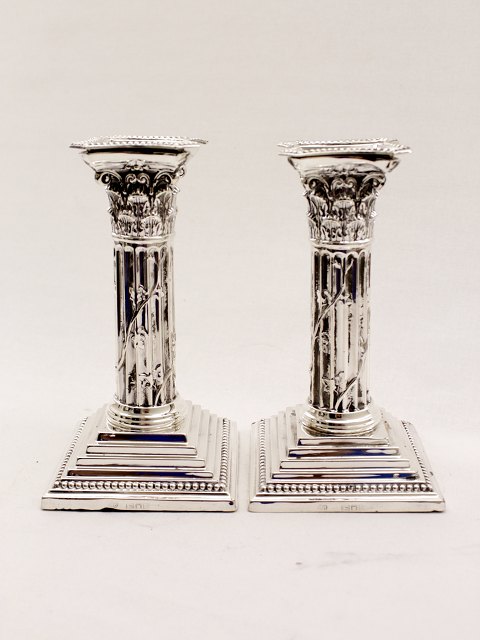 Sterling silver candlesticks sold