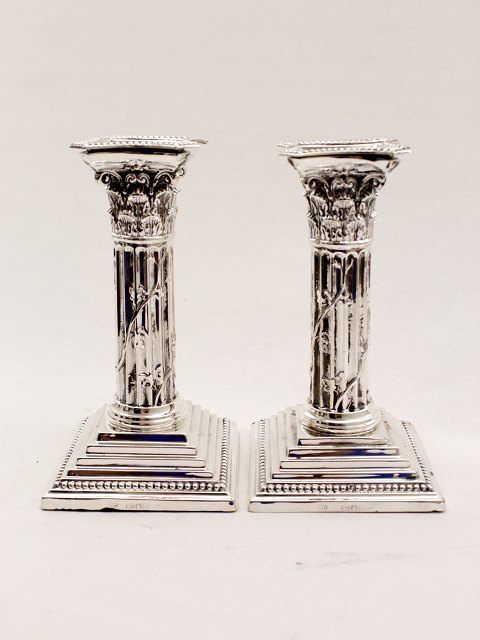 Sterling silver candlesticks sold