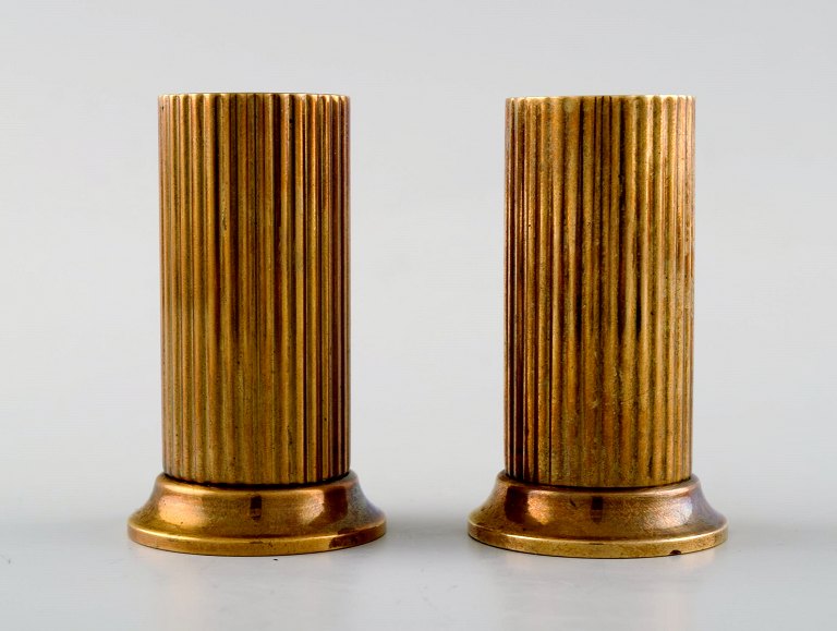 Tinos style art deco, a pair of salt and pepper shakers in bronze.
Denmark, 1940s.