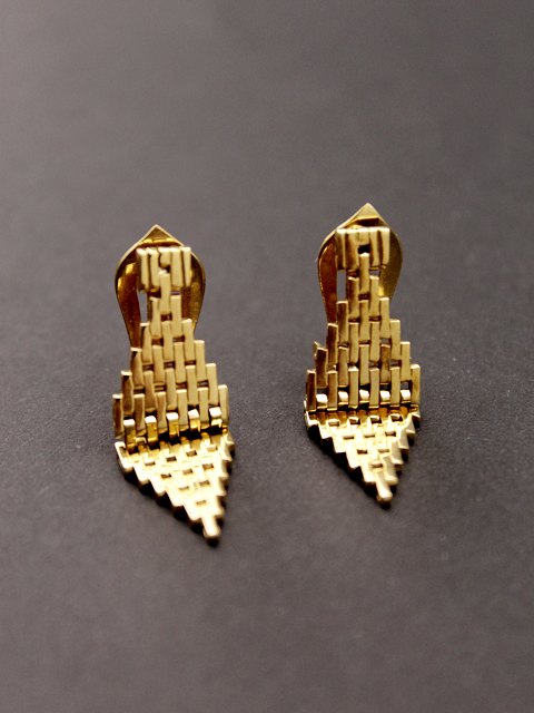 14 karat brick ear sold