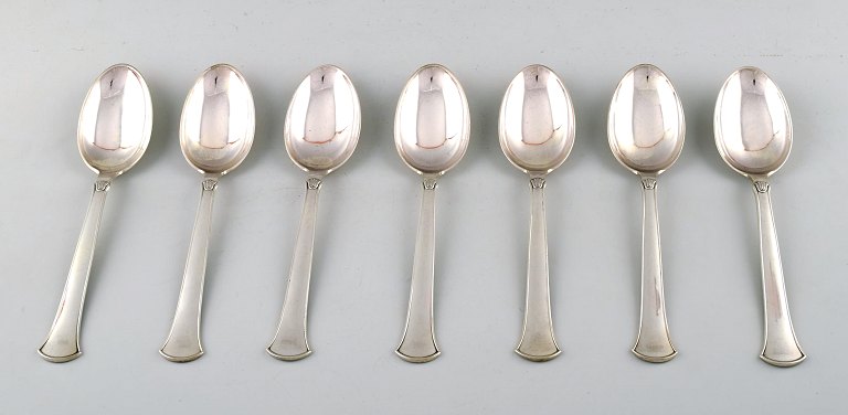 Hans Hansen silverware number 5, seven dessert spoons in sterling silver.