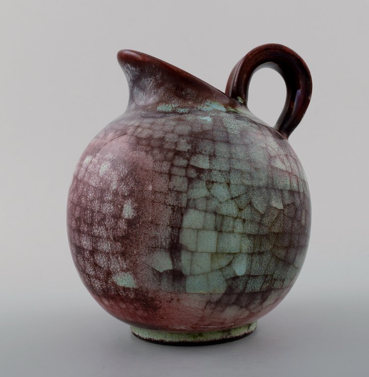 Michael Andersen. Art deco pitcher in art pottery in crackled style. Denmark 
1950s.

