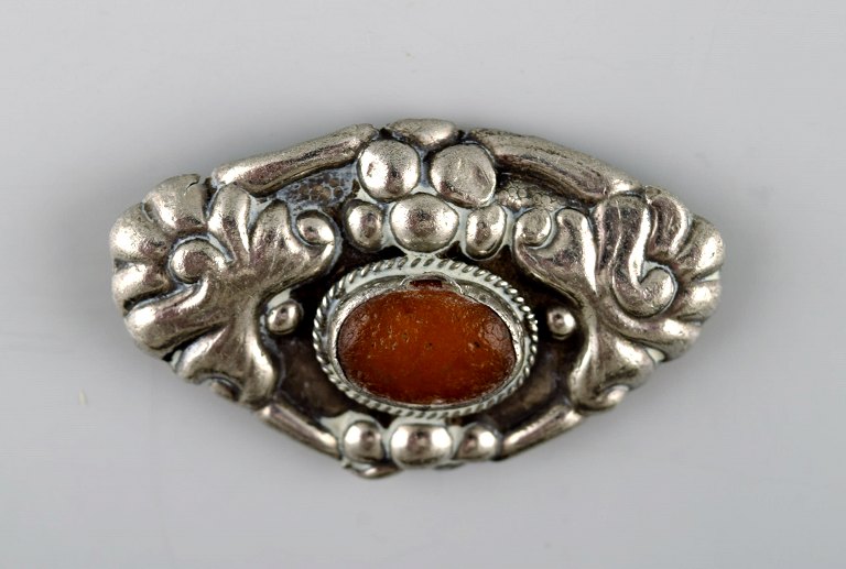 Danish Art Nouveau brooch in silver. 
Early 1900s.