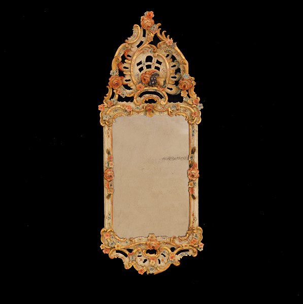 Original decorated Rococo mirror. Southgermany circa 1760. H: 91cm. W: 36cm