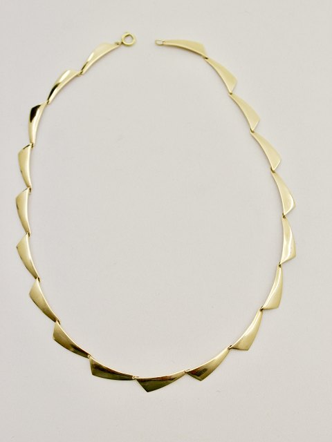 14 karat gold vintage "peak" necklace sold