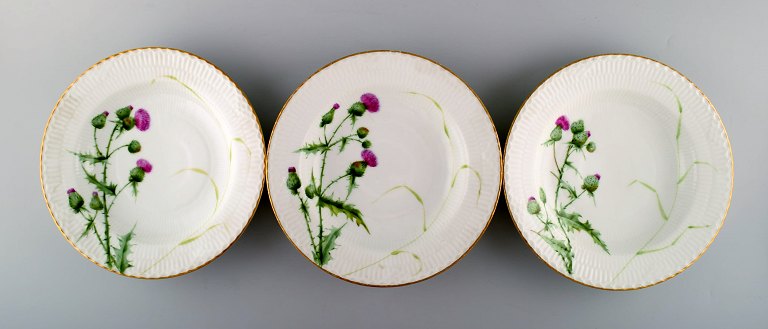 Three antique Royal Copenhagen plates hand painted in high quality with 
thistles.