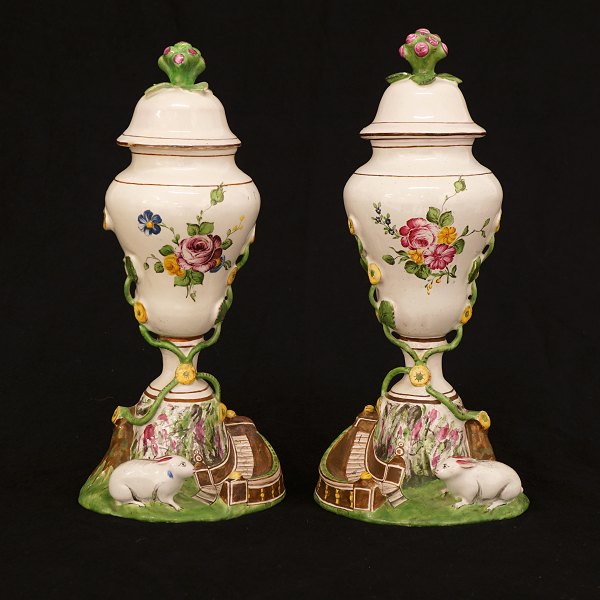 A pair of rabbit vases. Faience. Marieberg, Sweden. Signed 1778. H: 26,5cm