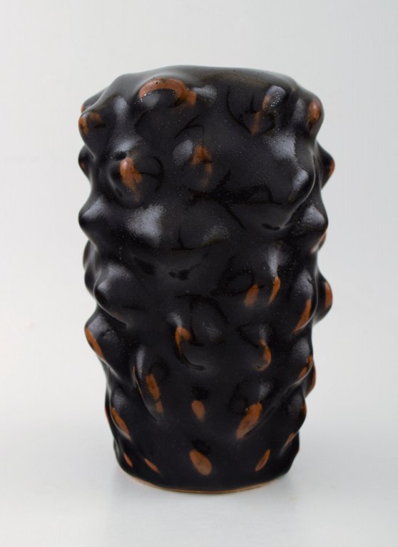 Axel Salto: b. Copenhagen 1889, d. Frederiksberg 1961:
Stoneware vase modeled in budding style.