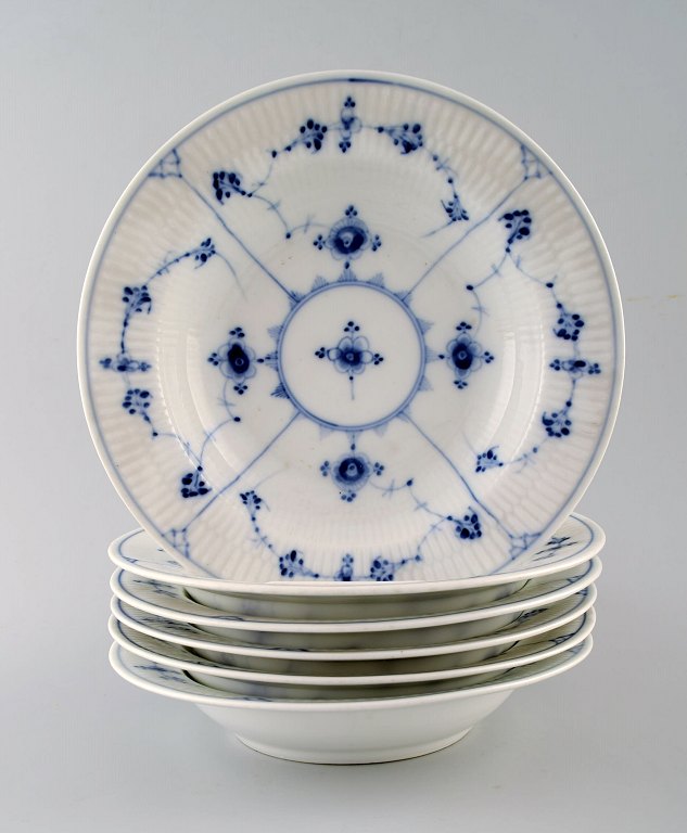 Six antique Royal Copenhagen Blue fluted deep plates.
