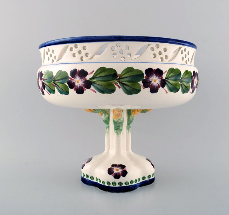 Aluminia, Copenhagen, large openwork centerpiece, hand painted with floral 
motifs.