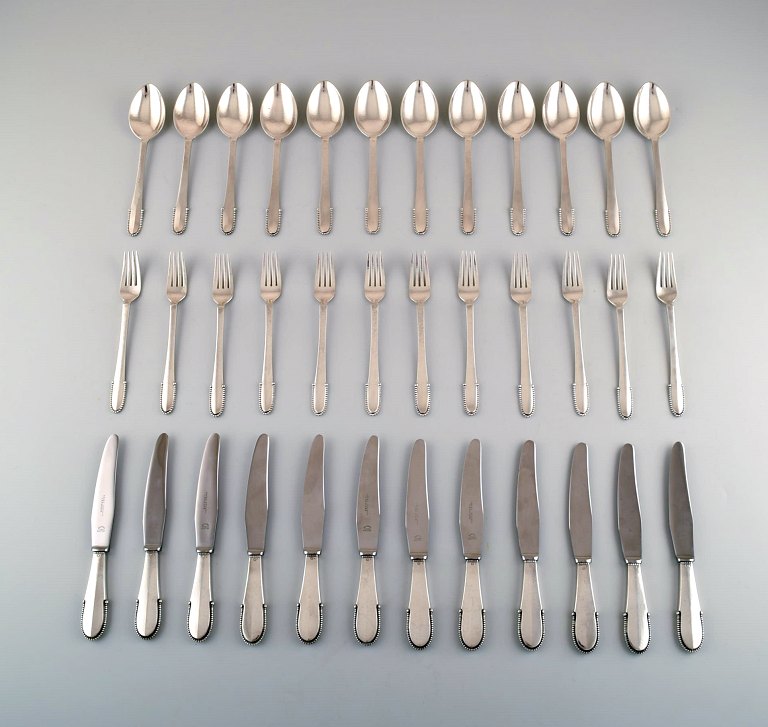 Georg Jensen Kugle komplet 12 personers frokostservice.
