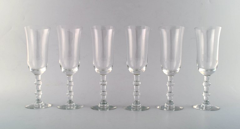 SIMON GATE FOR ORREFORS, A set of six champagne art glasses. 
Designer: Simon Gate.