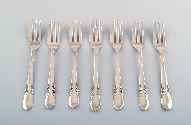 Danish silver (830), 7 cake forks.
