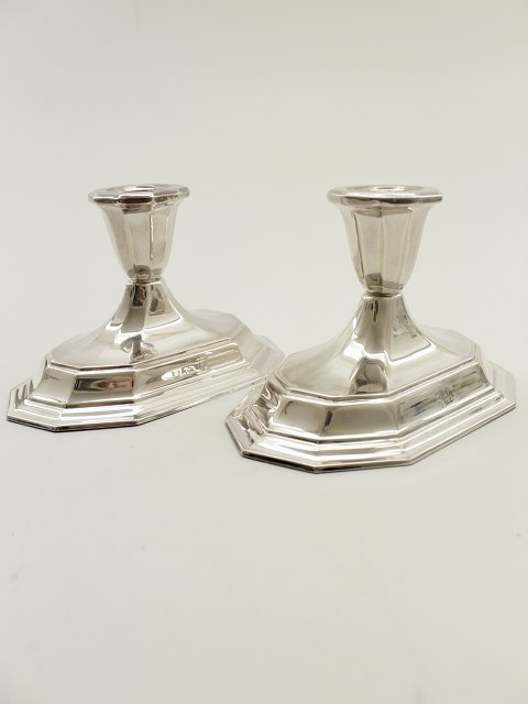 A pair of silver candlesticks