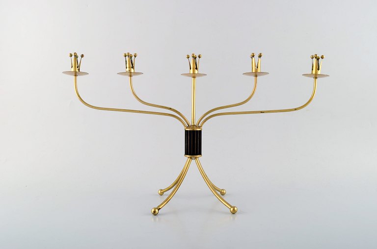 Swedish modernist five-armed brass candlestick.
