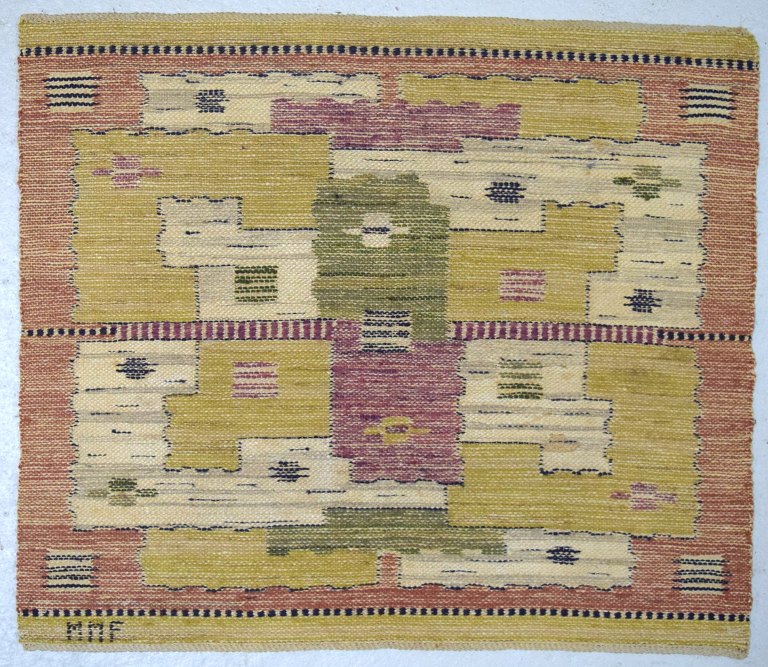 Märta Måås-Fjetterström, Sweden b. 1873, d. 1941
Handwoven carpet, wool, "rölakan" technique. 
Signed monogram MMF.
