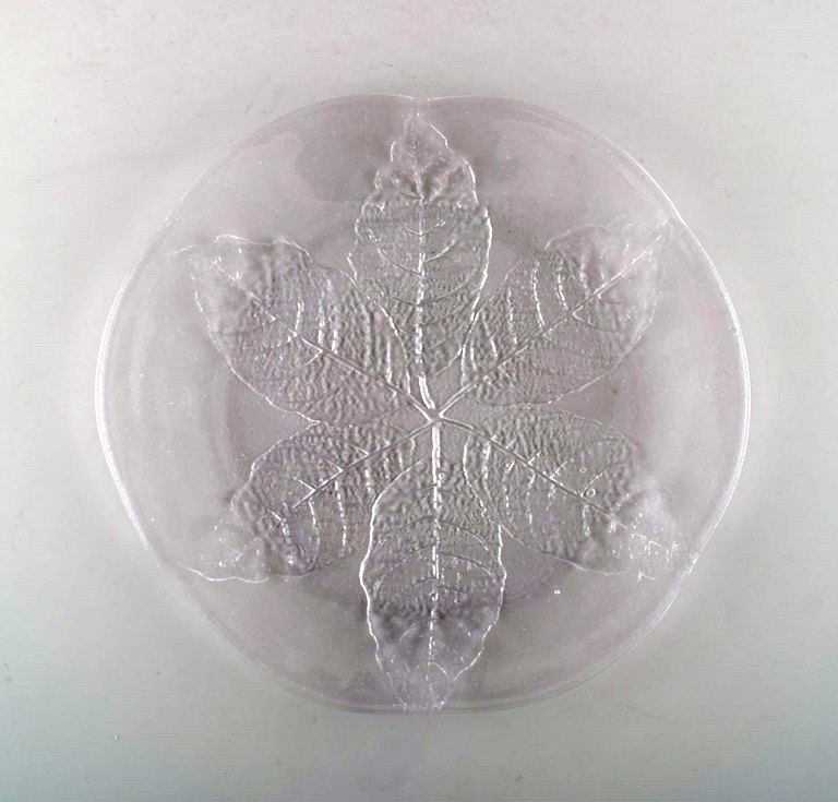 Scandinavian art glass. 21 mouth blown cover plates in art glass  adorned with 
leaves. 1960 s.
