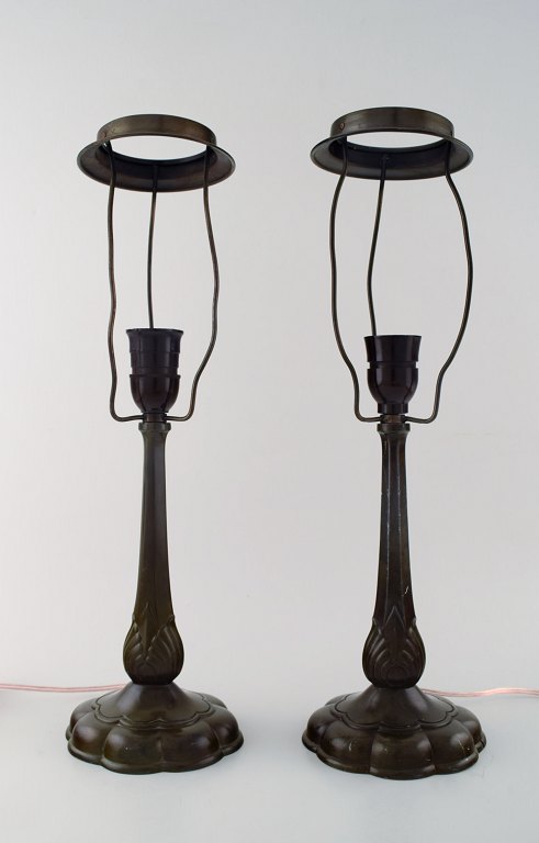 Just Andersen. A pair of table lamps in patinated "disko" metal.
