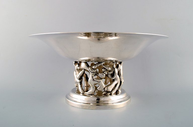 Jean Boggio for Roux-Marquiand, France. Large modernist compote in plated 
silver. Base with motive of dancing circus artists.