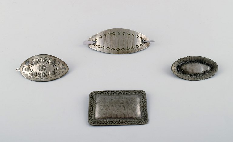 Jorgen Jensen, a.o. Denmark. 4 brooches in pewter. Hand made danish design, 60 / 
70 s.