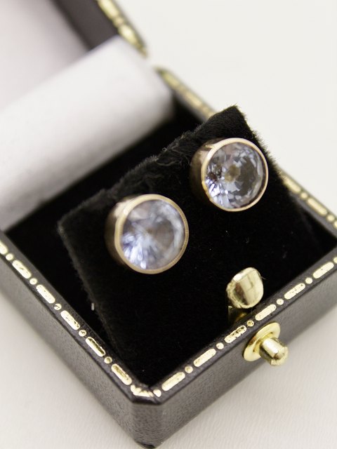 14 karat gold studs with aquamarine  sold