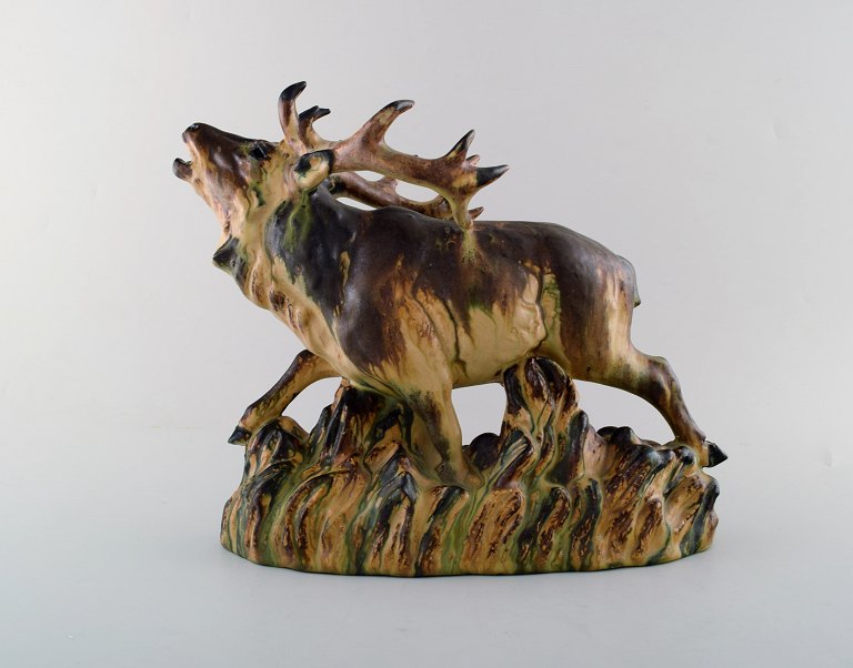 Large Arne Ingdam ceramic figure. Roaring deer.
