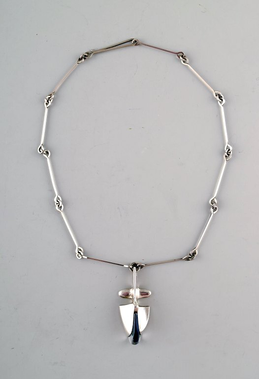 Björn Weckström, Lapponia, Finland.
Vintage modernist necklace in sterling silver with blue stone in pendant, 
handmade.