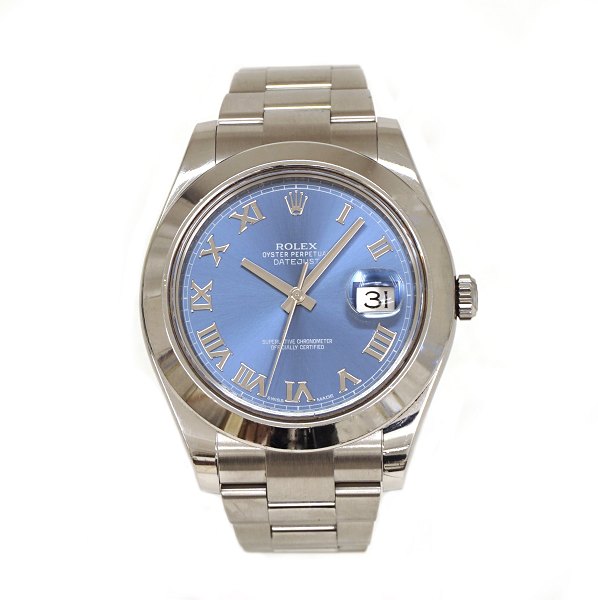 Rolex Oyster Perpetual Datejust Ref. 116300 with blue dial. Sold 14.03.2014. Box 
and  papers. Good condition with signs of use. D: 42mm