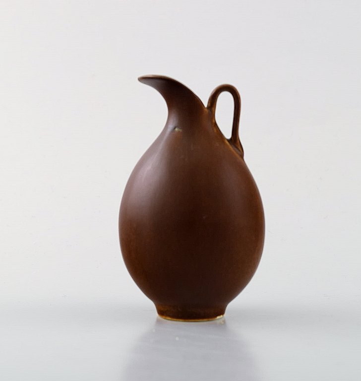 Berndt Friberg for Gustavsberg. Modernist jug in ceramics. Beautiful glaze in 
brown shades. 1960