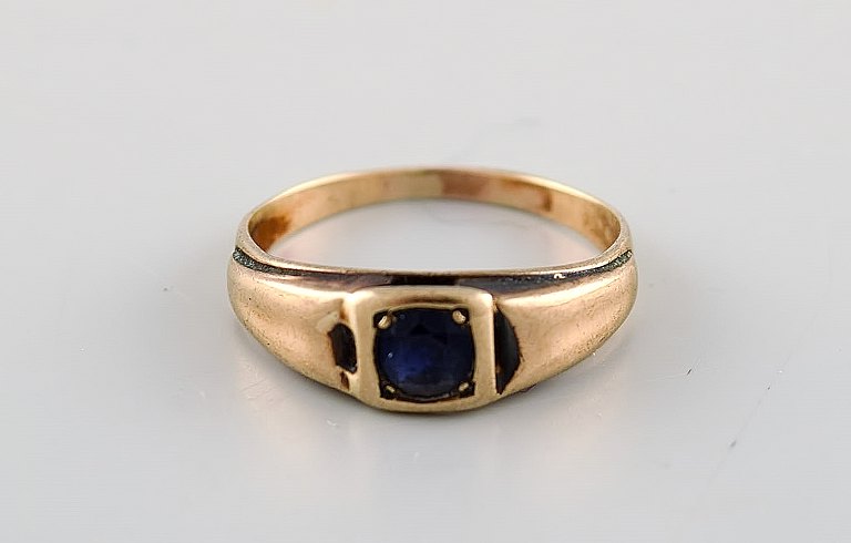 Danish goldsmith. Art deco gold ring with beautiful bluish semi precious stone. 
1930