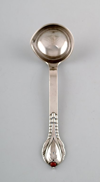 Evald Nielsen number 3, sauce spoon in hammered all silver (830) with cabochon 
coral bead. 1920