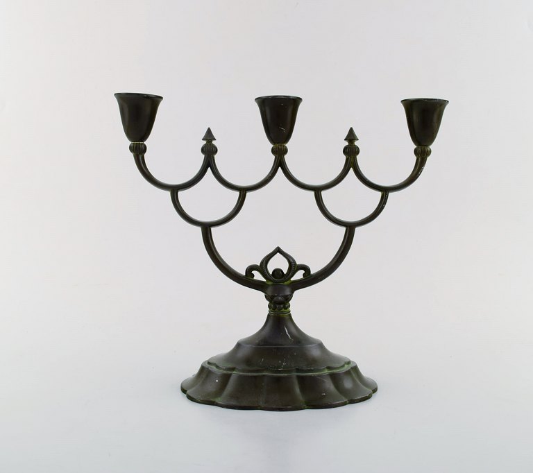 Just Andersen, early three-armed candlestick of patinated "disko" metal. Denmark 
1930