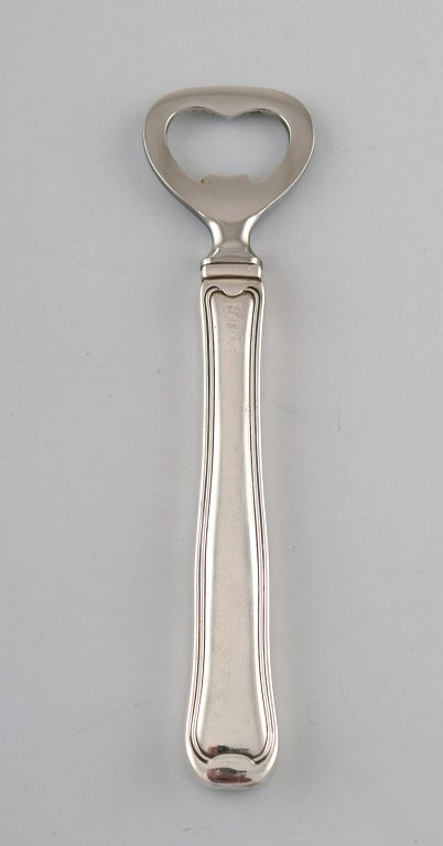 Georg Jensen Old Danish bottle opener in sterling silver and stainless steel.