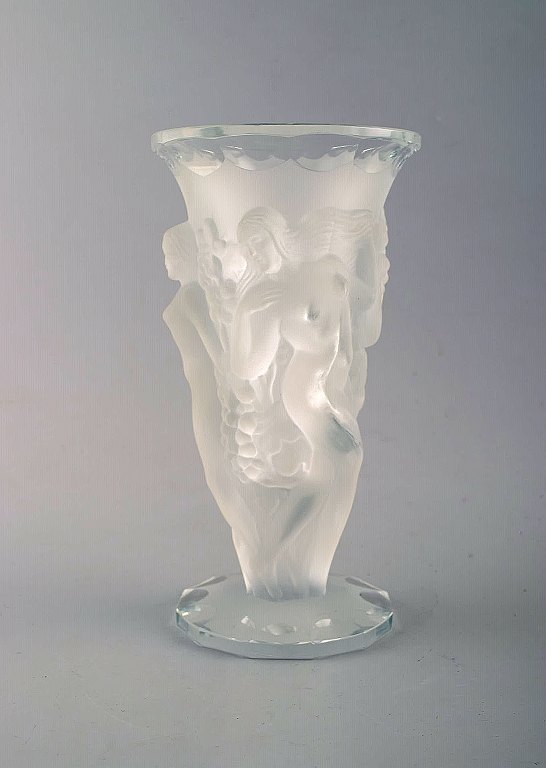 René Lalique "Bacchantes" vase in clear art glass decorated with dancing nymphs. 
1930