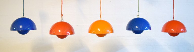 Verner Panton (1926-1998). Five early Verner Panton "Flowerpot" pendants / 
ceiling lights in orange, red and blue enamel. 1970