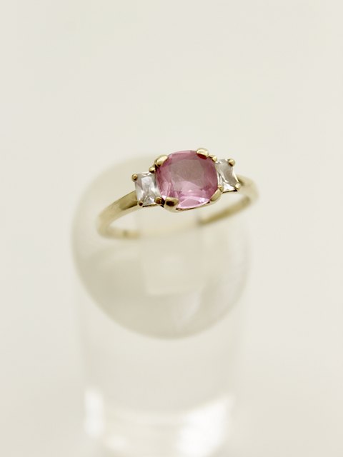 8 carat gold ring  with large pink and 2 clear stones sold