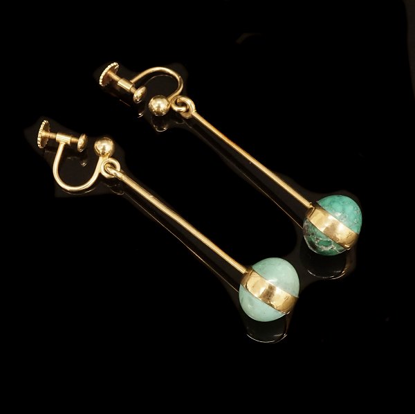 Georg Jensen, Denmark: A pair of 18kt gold earrings. #1140. L: 5cm